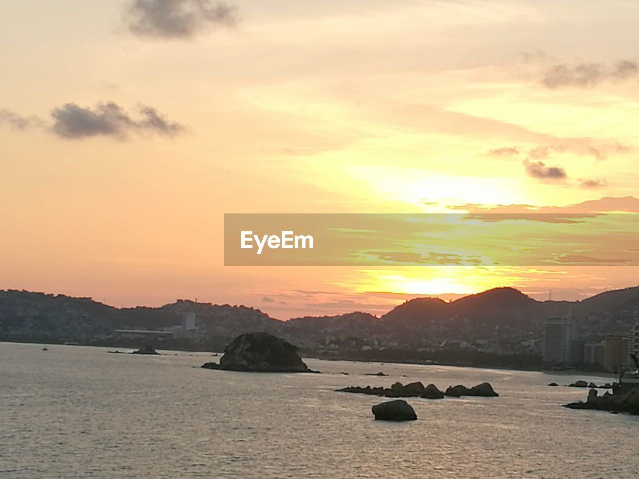 VIEW OF SEA AGAINST SKY DURING SUNSET