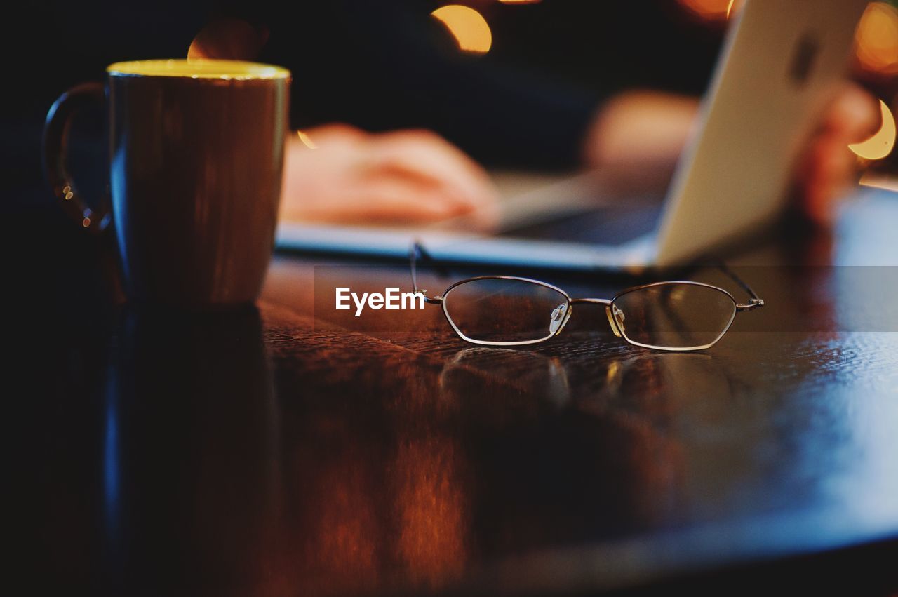 Close-up of eyeglasses on table