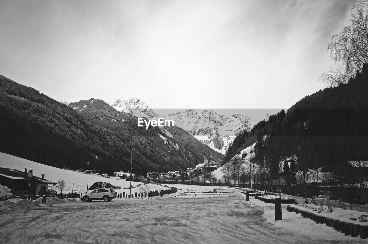 Scenic view of mountains against sky during winter