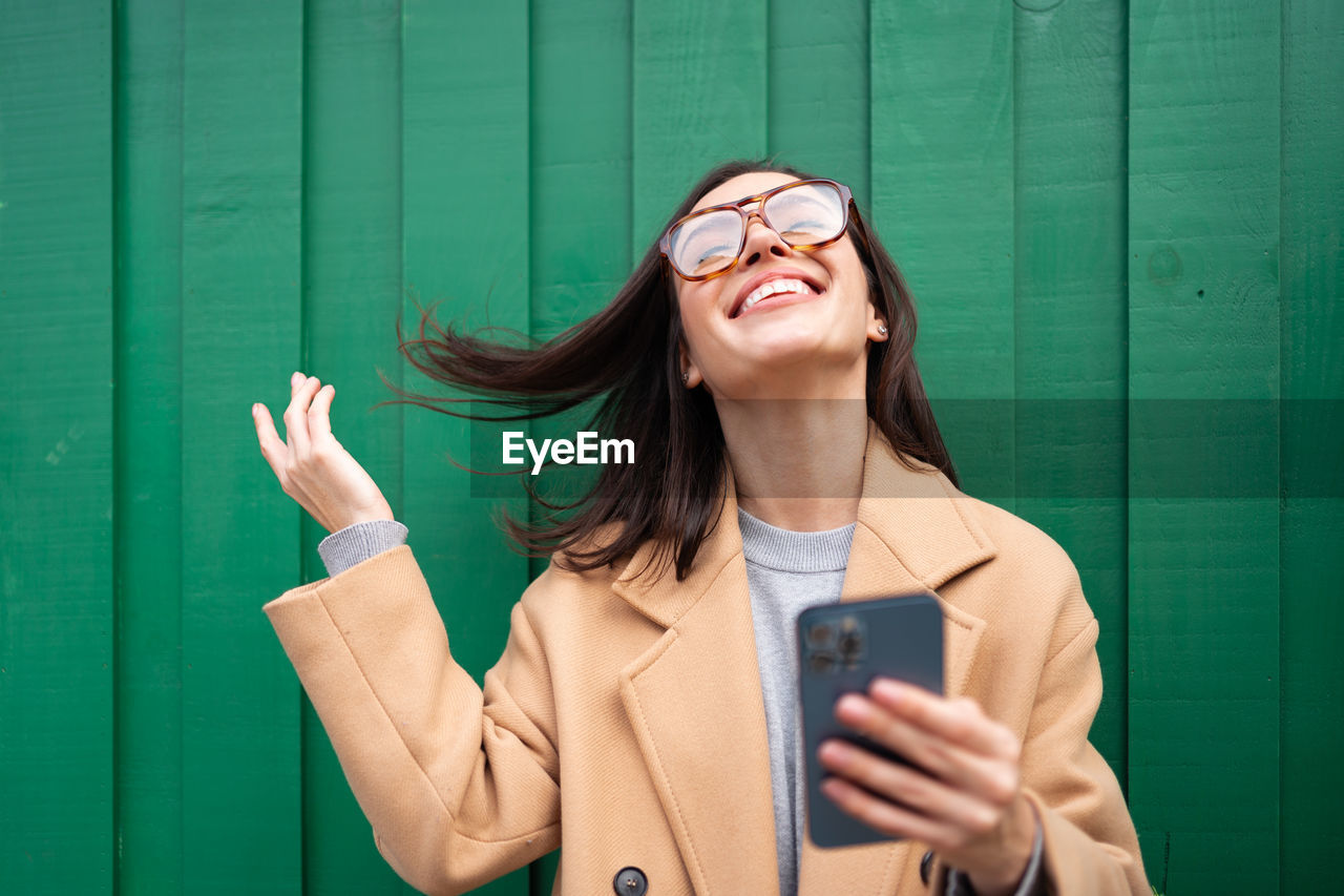 portrait of woman using mobile phone