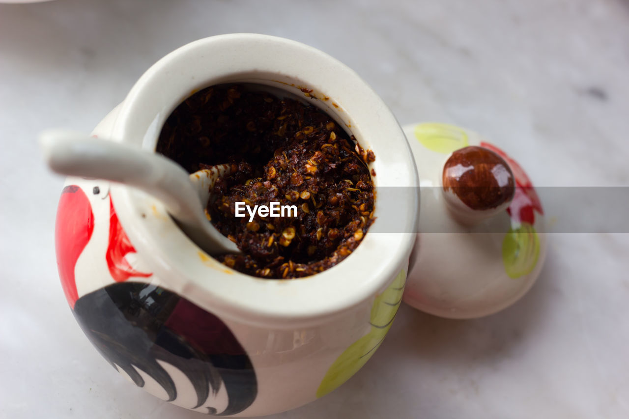 CLOSE-UP OF DESSERT IN CONTAINER