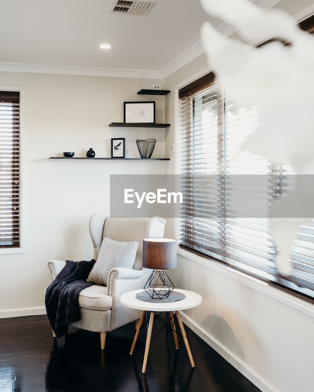 CHAIRS AND TABLE IN LIVING ROOM