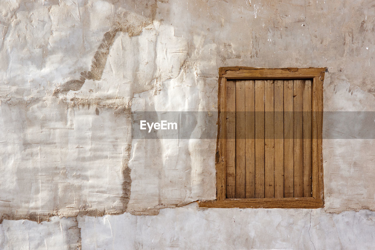 Wooden window of old building