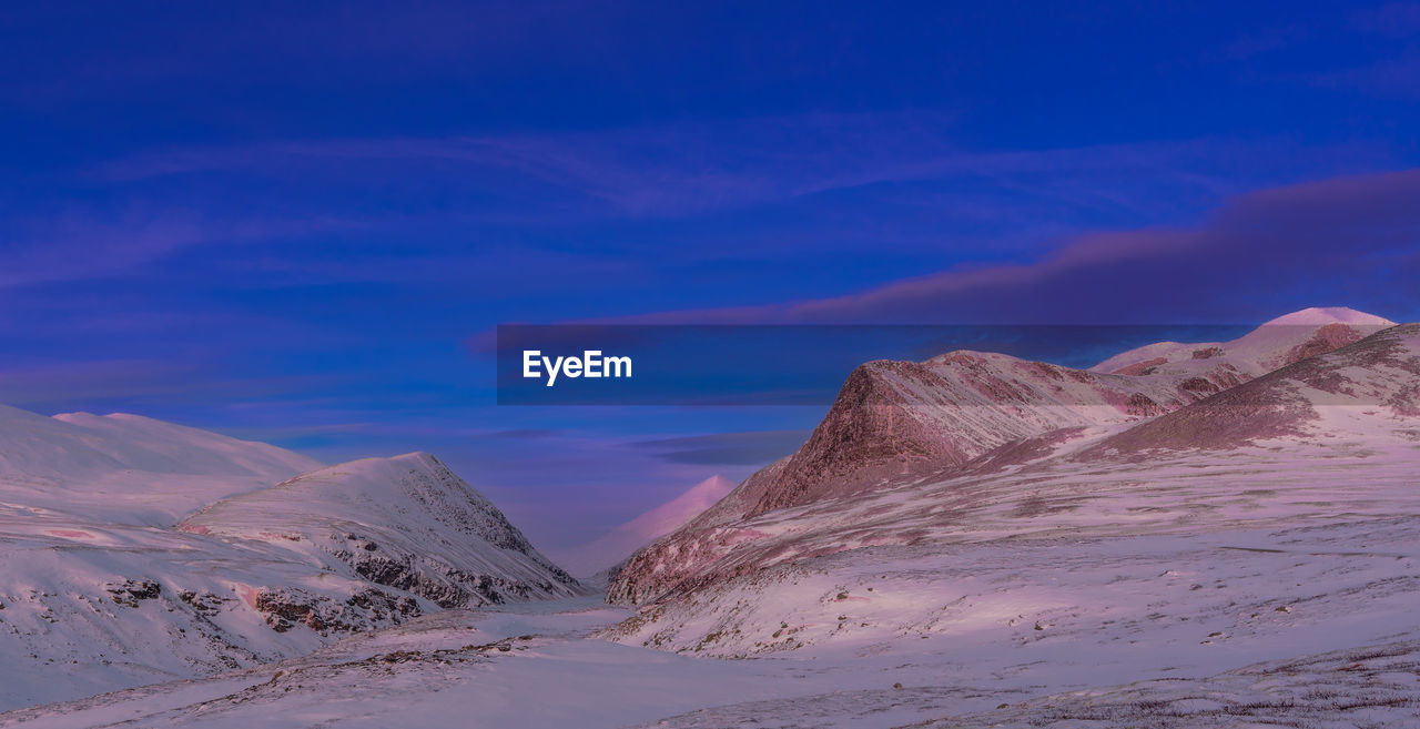 Surrounded by the snowy mountains of rondvassbu