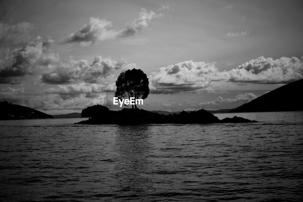 sky, water, cloud, black and white, darkness, monochrome, horizon, monochrome photography, beauty in nature, reflection, sea, scenics - nature, nature, black, tranquility, mountain, tranquil scene, ocean, silhouette, dusk, land, no people, environment, outdoors, coast, tree, rock, non-urban scene, landscape