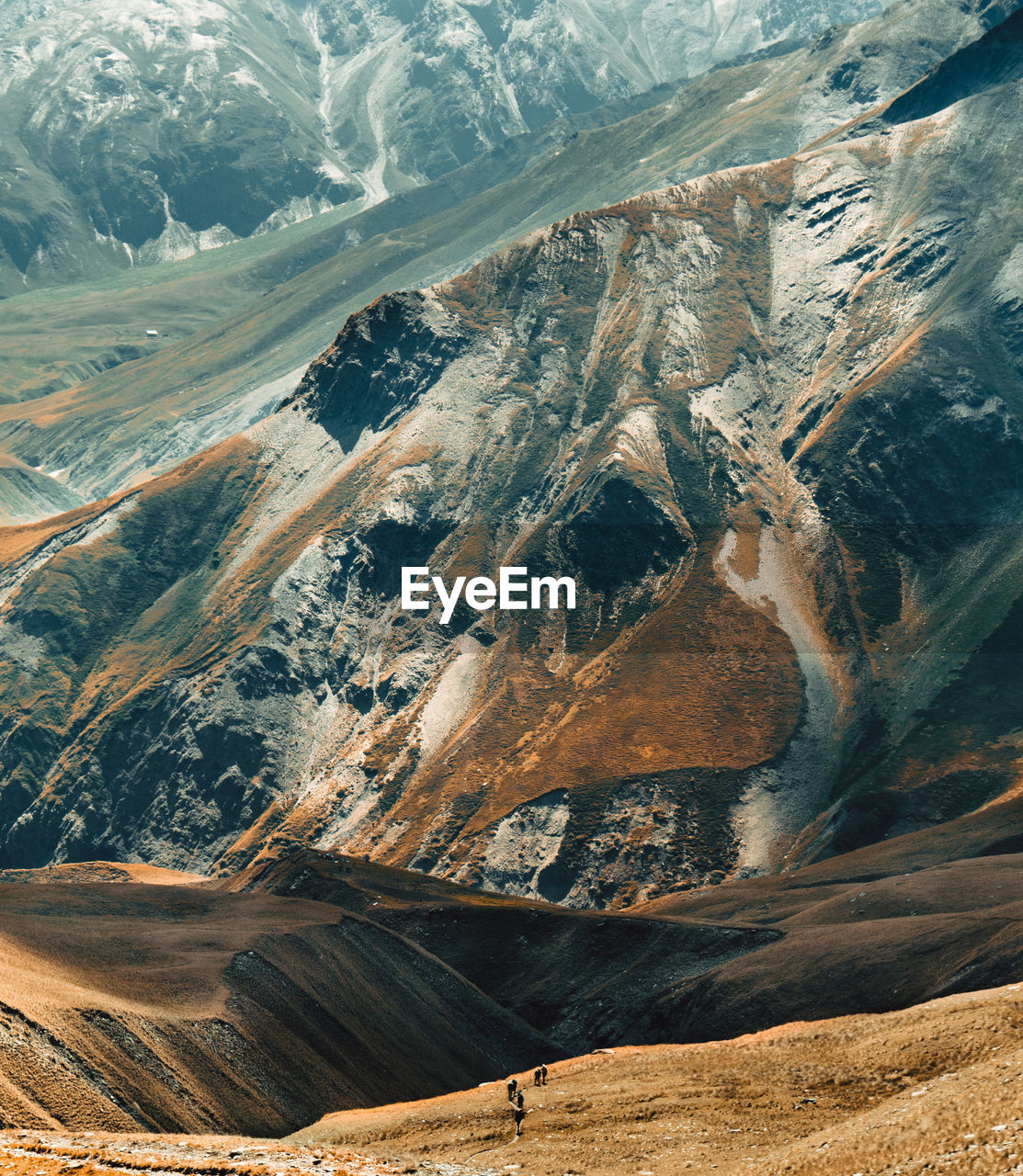 Aerial view of landscape with mountain range in background