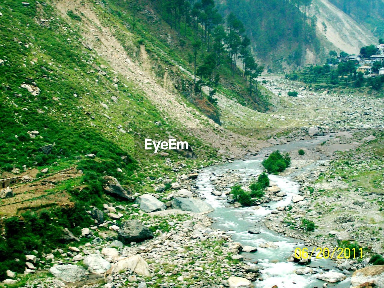 HIGH ANGLE VIEW OF ROAD AMIDST MOUNTAINS