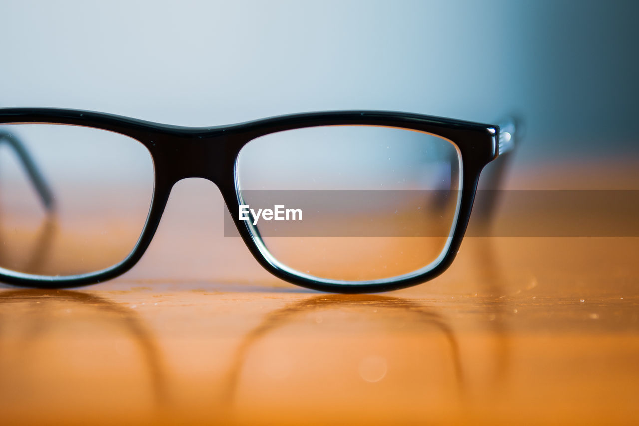 Close-up of eyeglasses on table