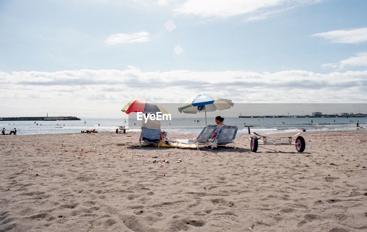 VIEW OF PEOPLE ON BEACH