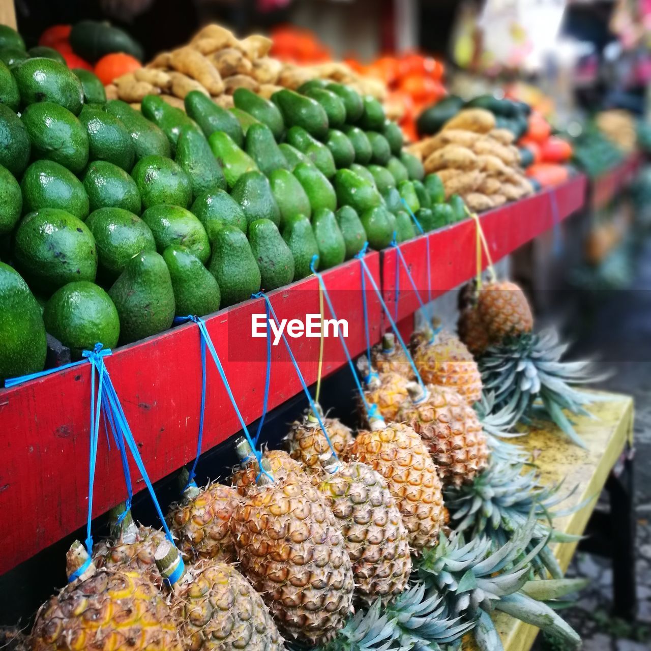 Close-up of vegetables and fruits for sale at market stall