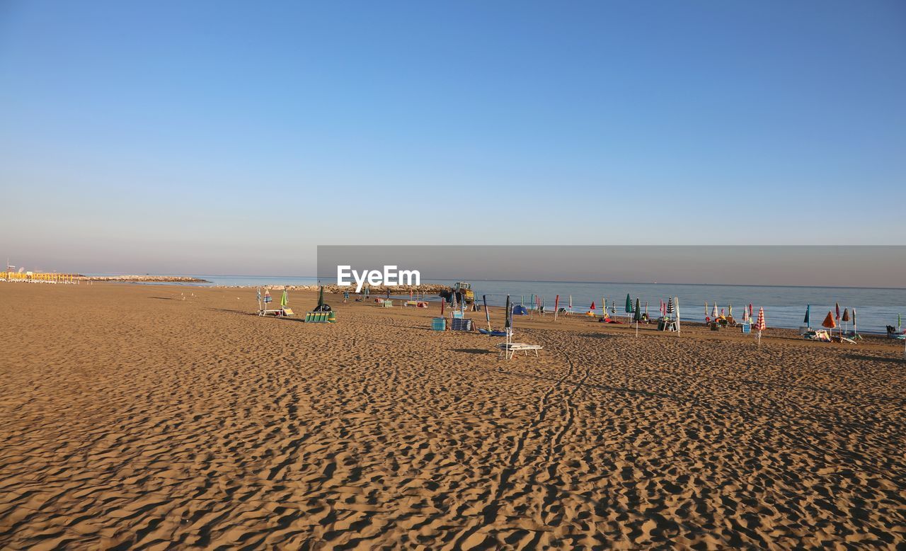 GROUP OF PEOPLE ON BEACH