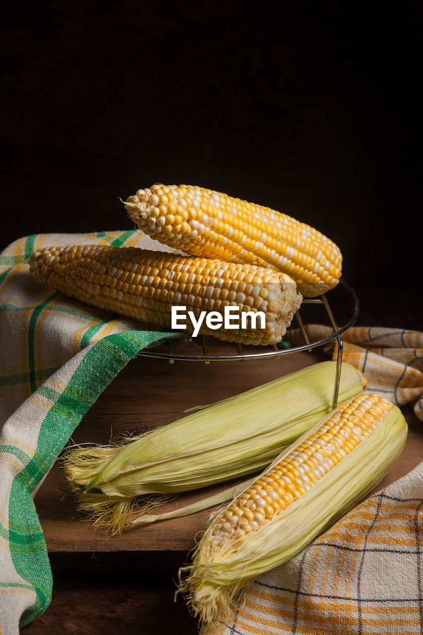 close-up of corn against black background