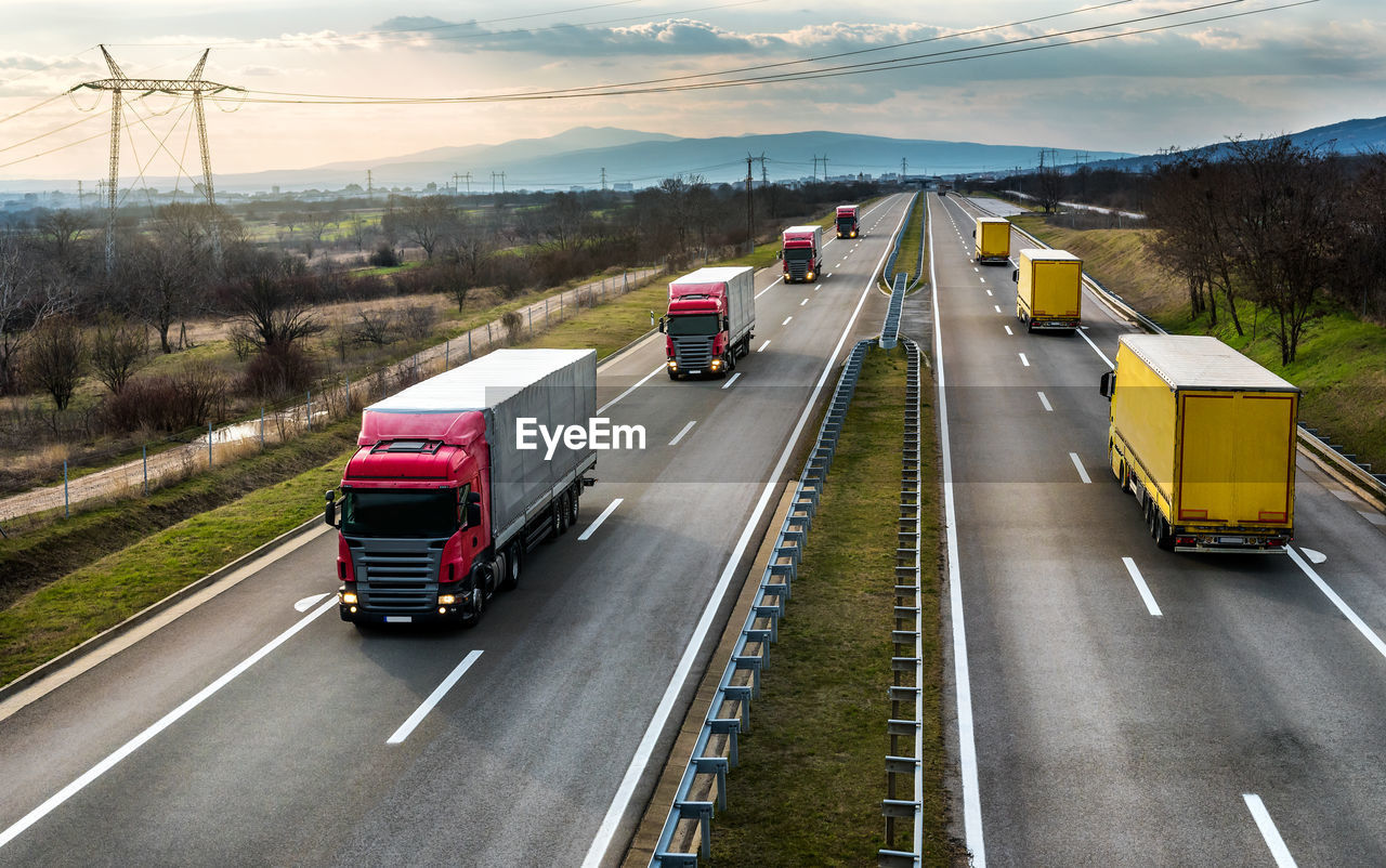 VEHICLES ON HIGHWAY ROAD