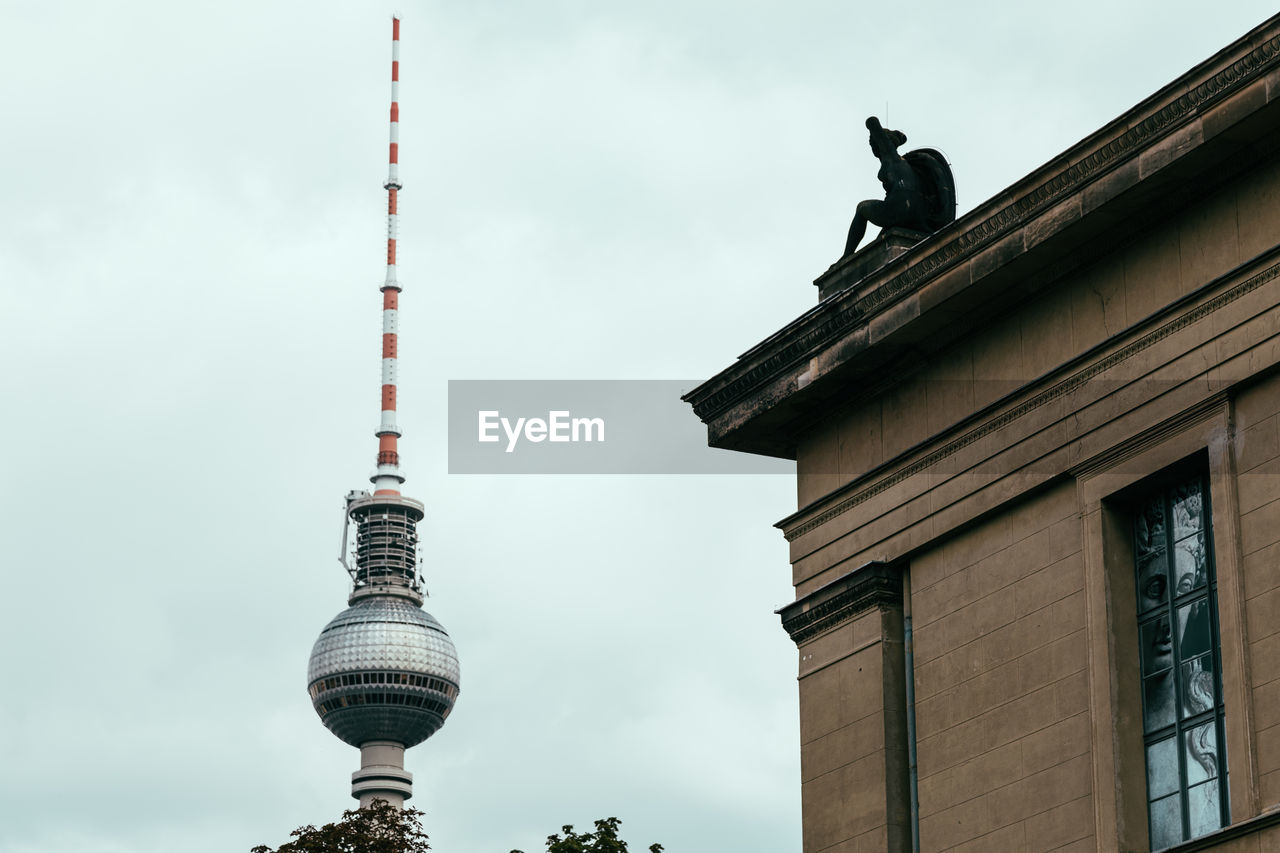 Low angle view of building against fernsehturm