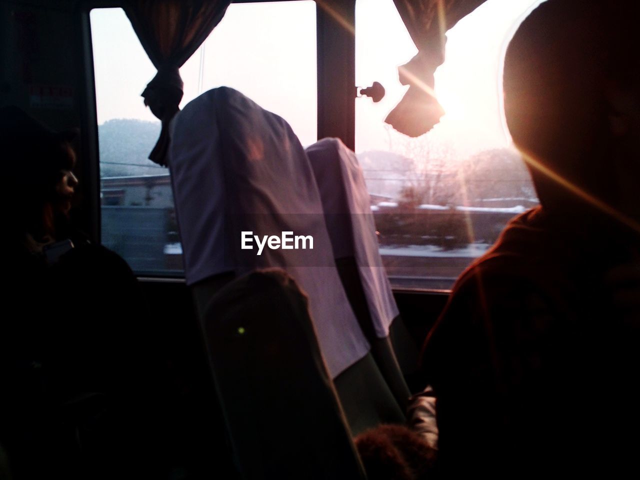VIEW OF PEOPLE IN TRAIN