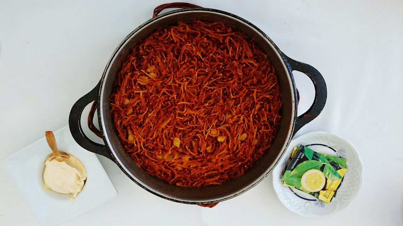 High angle view of fideua served on table