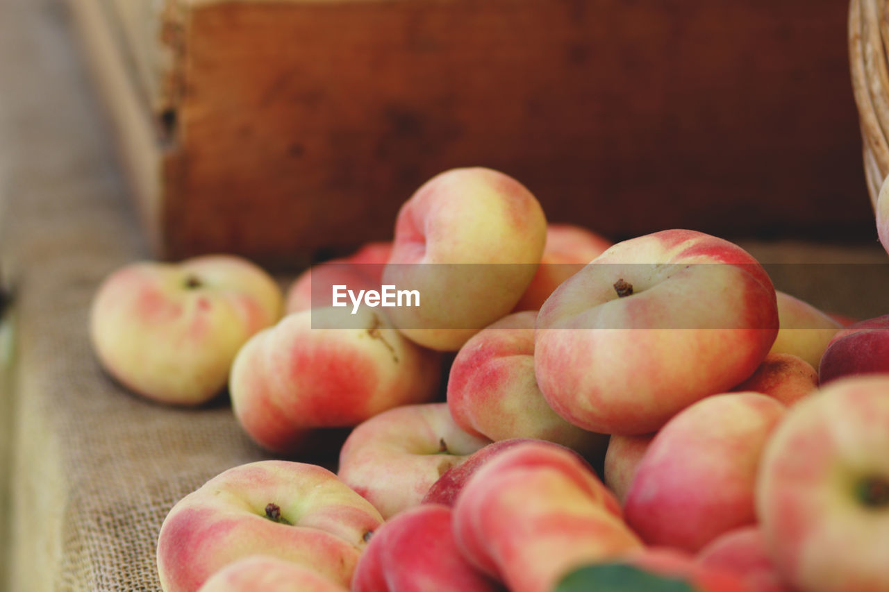 Saturn peaches for sale at market stall