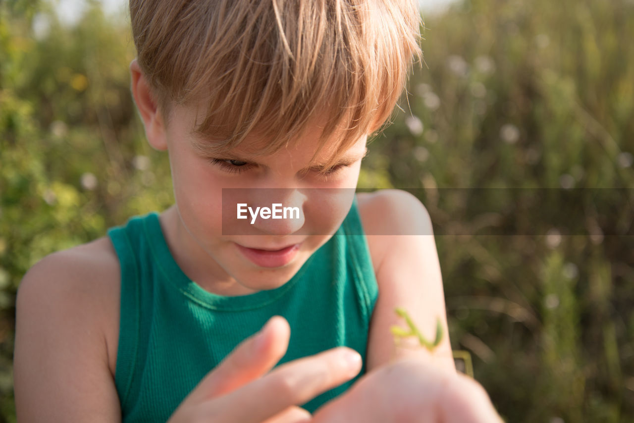 Portrait of boy looking at camera