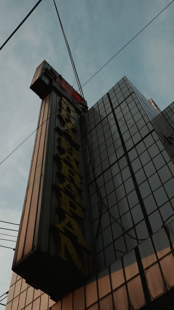 LOW ANGLE VIEW OF BUILDINGS AGAINST SKY