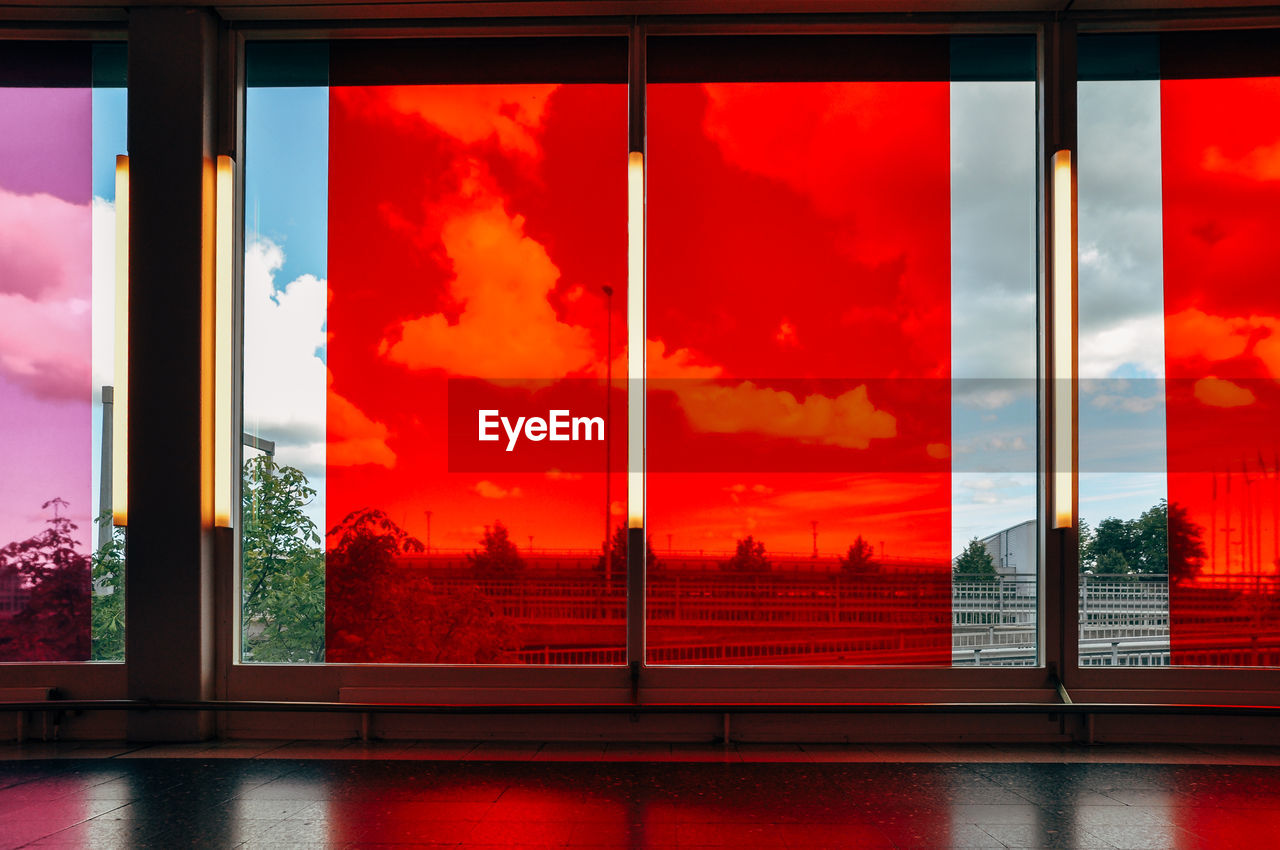 Cloudy sky seen through glass window