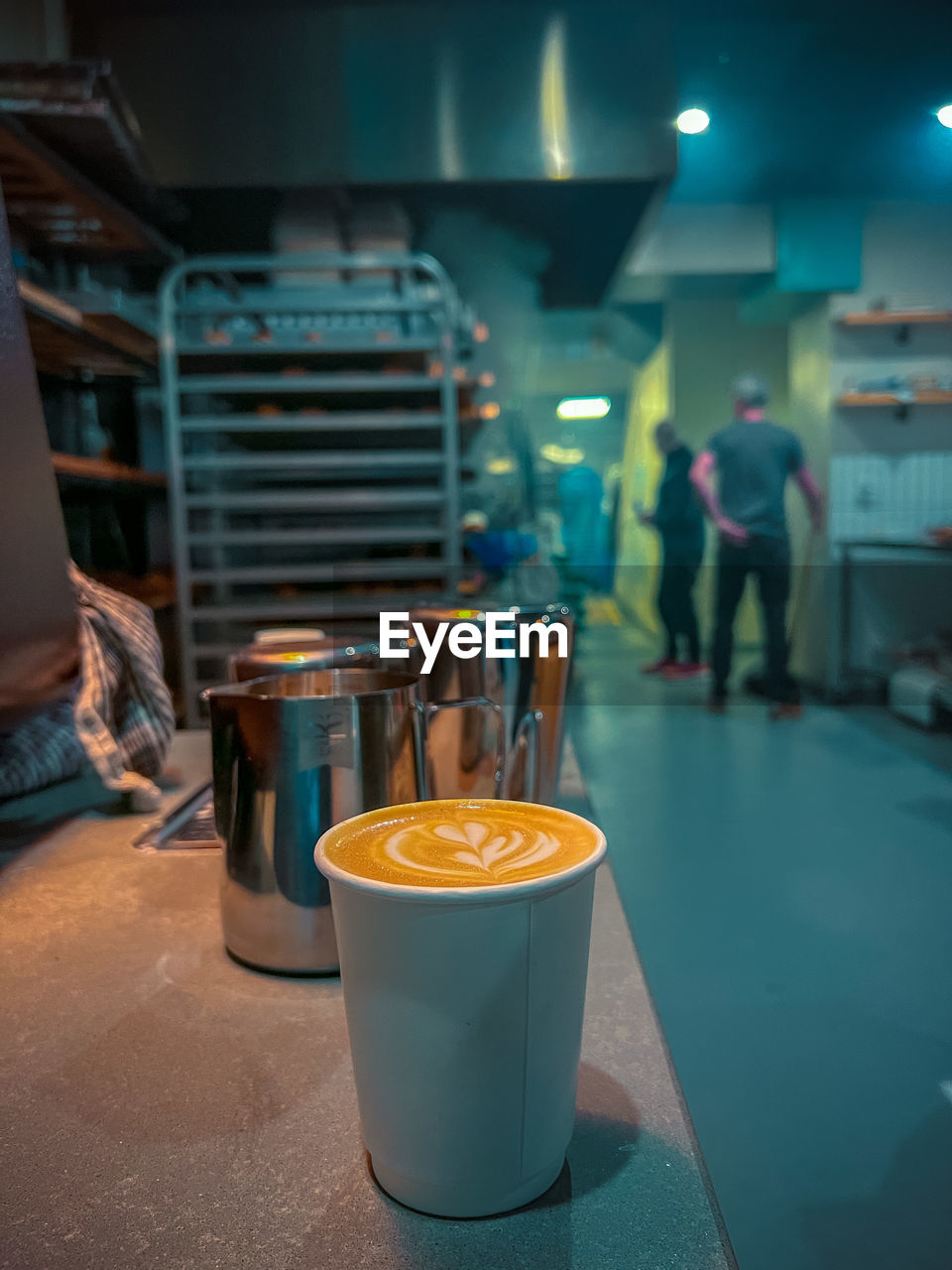 food and drink, drink, indoors, business, food, adult, blue, lighting, focus on foreground, refreshment, men, occupation, night, coffee