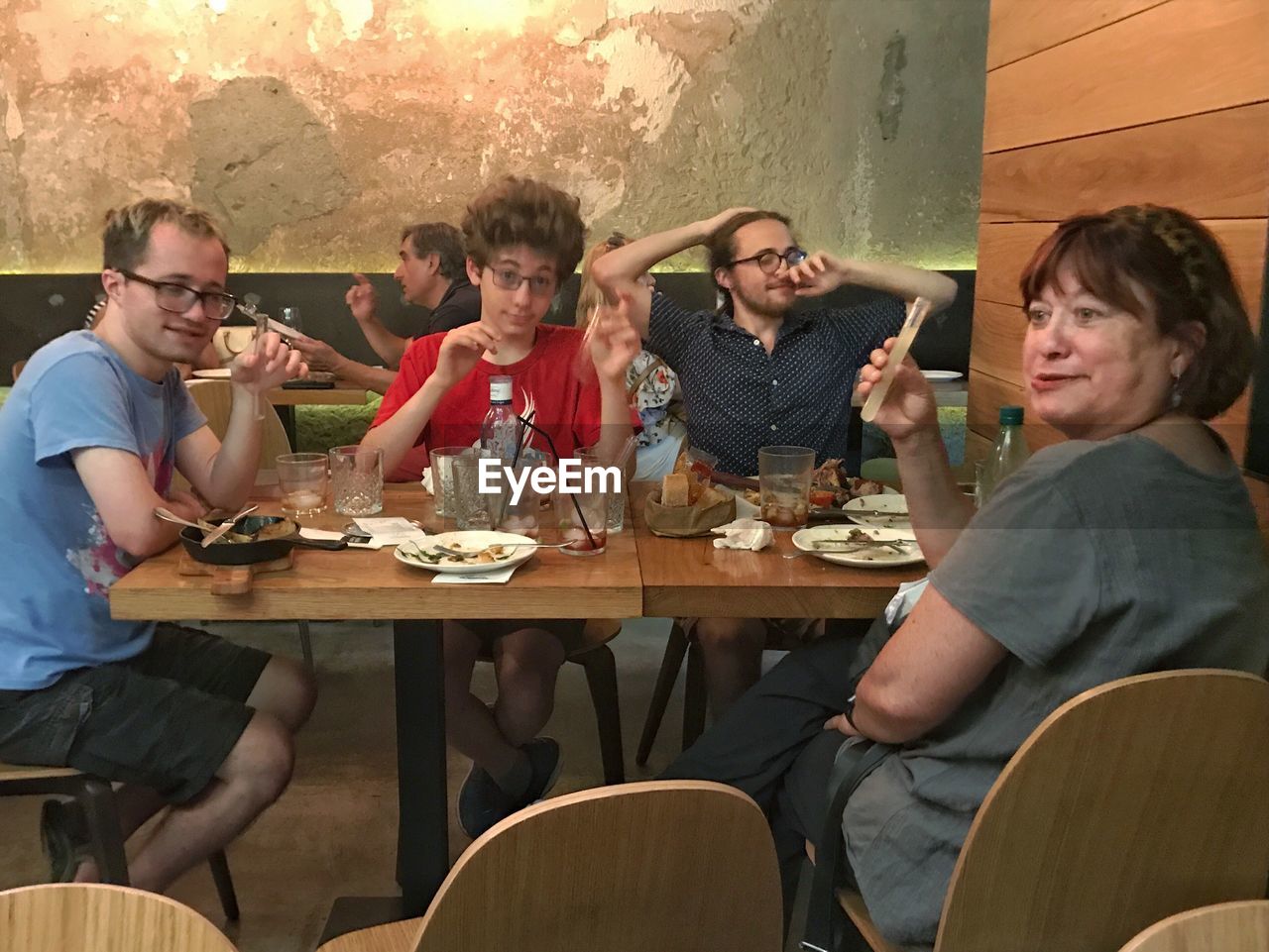 People enjoying food at restaurant