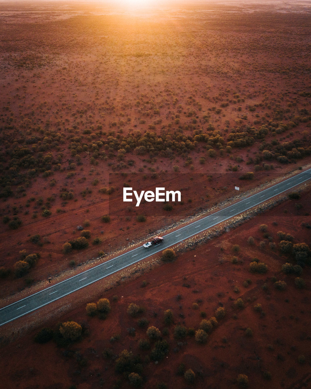 Aerial view of car on road in desert