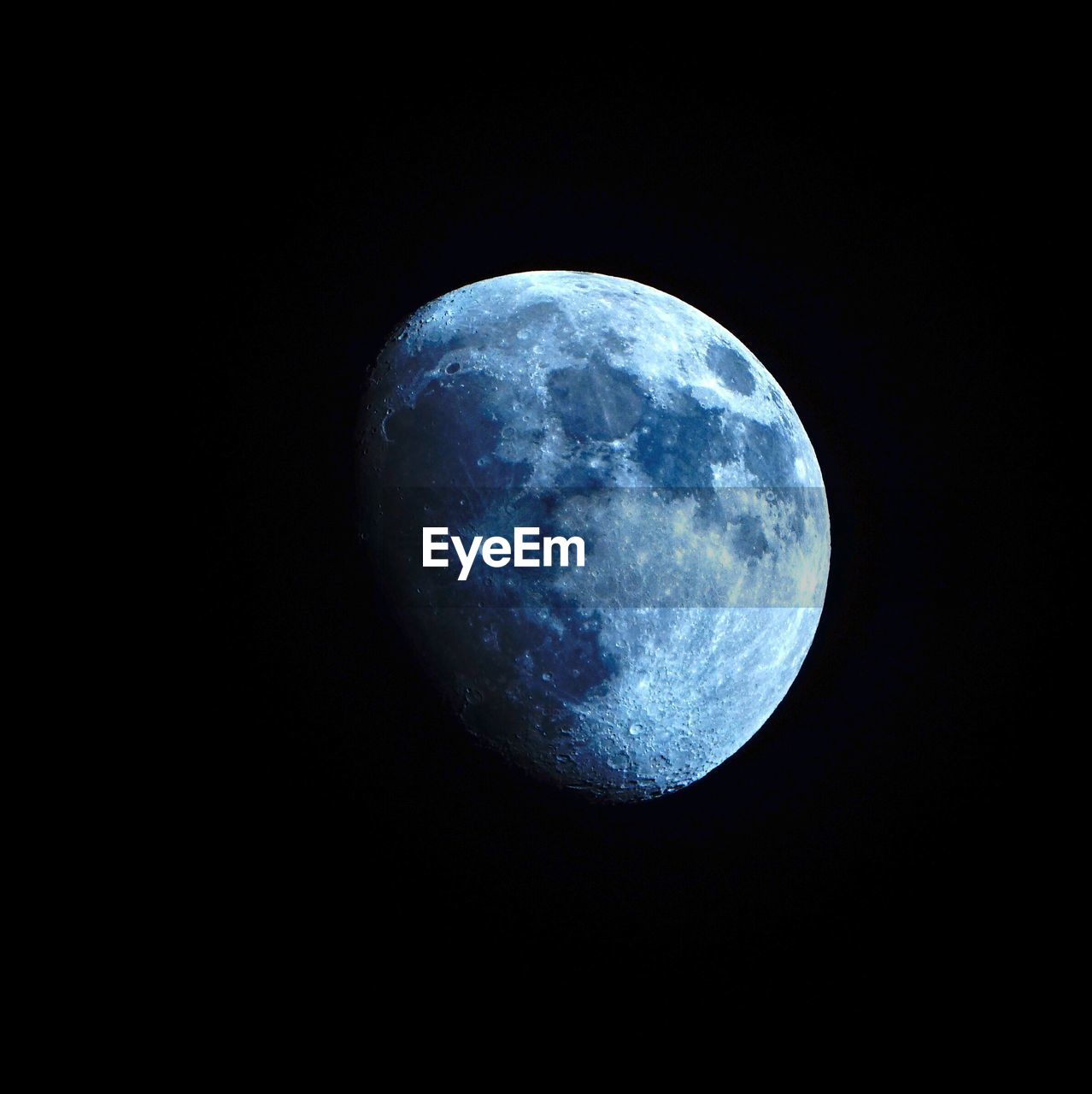 LOW ANGLE VIEW OF HALF MOON AGAINST SKY AT NIGHT