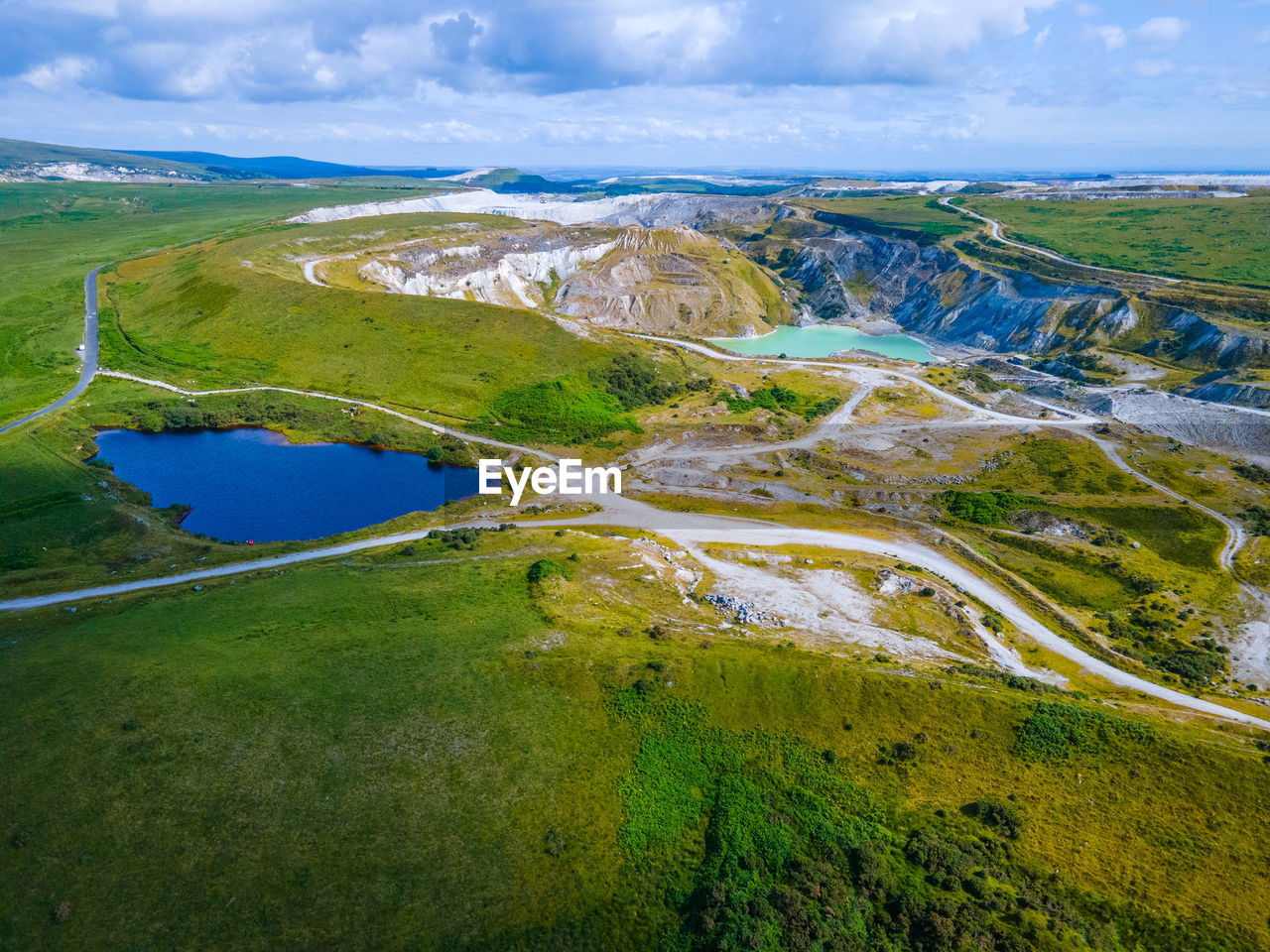 High angle  aerial view of landscape against sky, including lakes