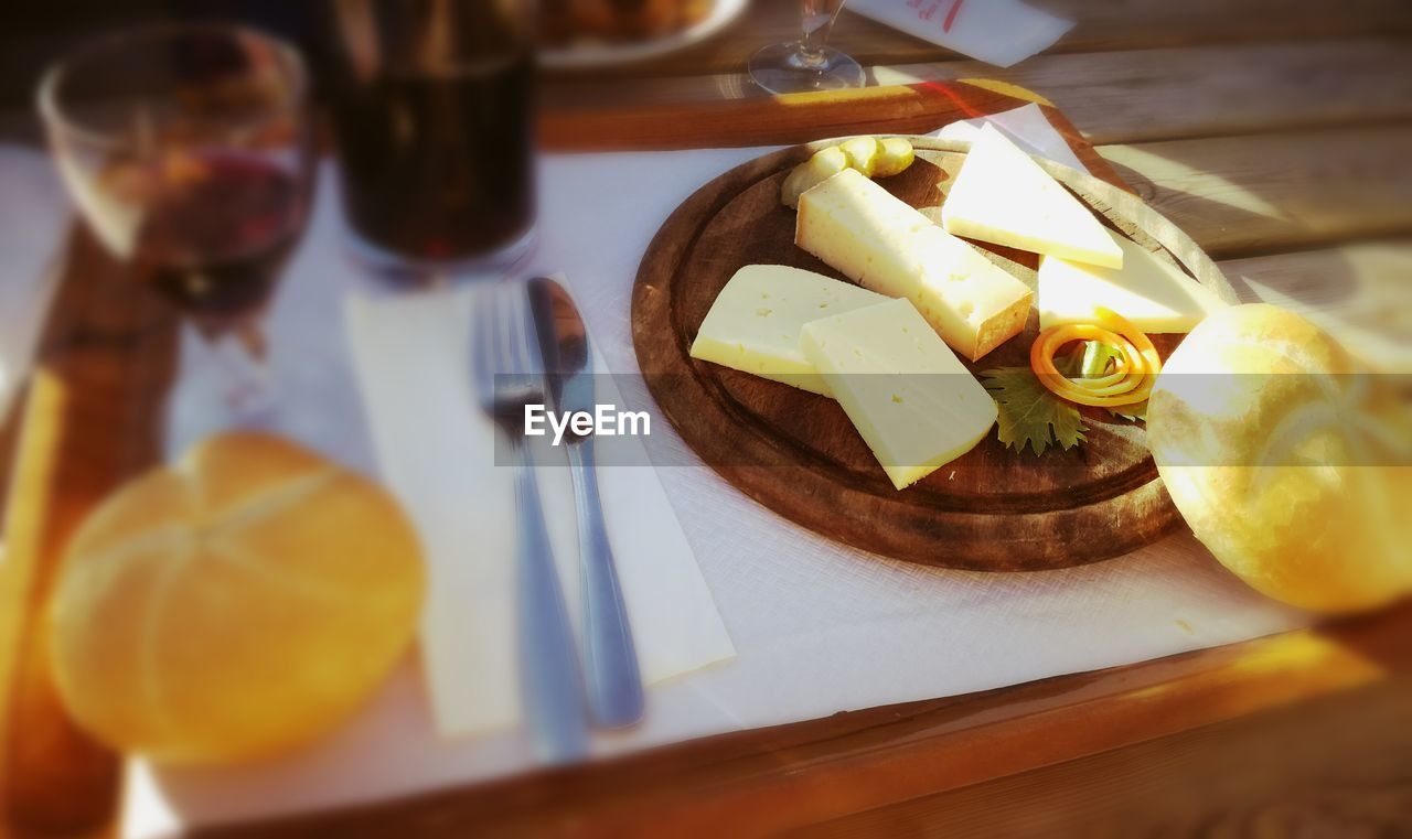 CLOSE-UP OF FRUITS ON TABLE