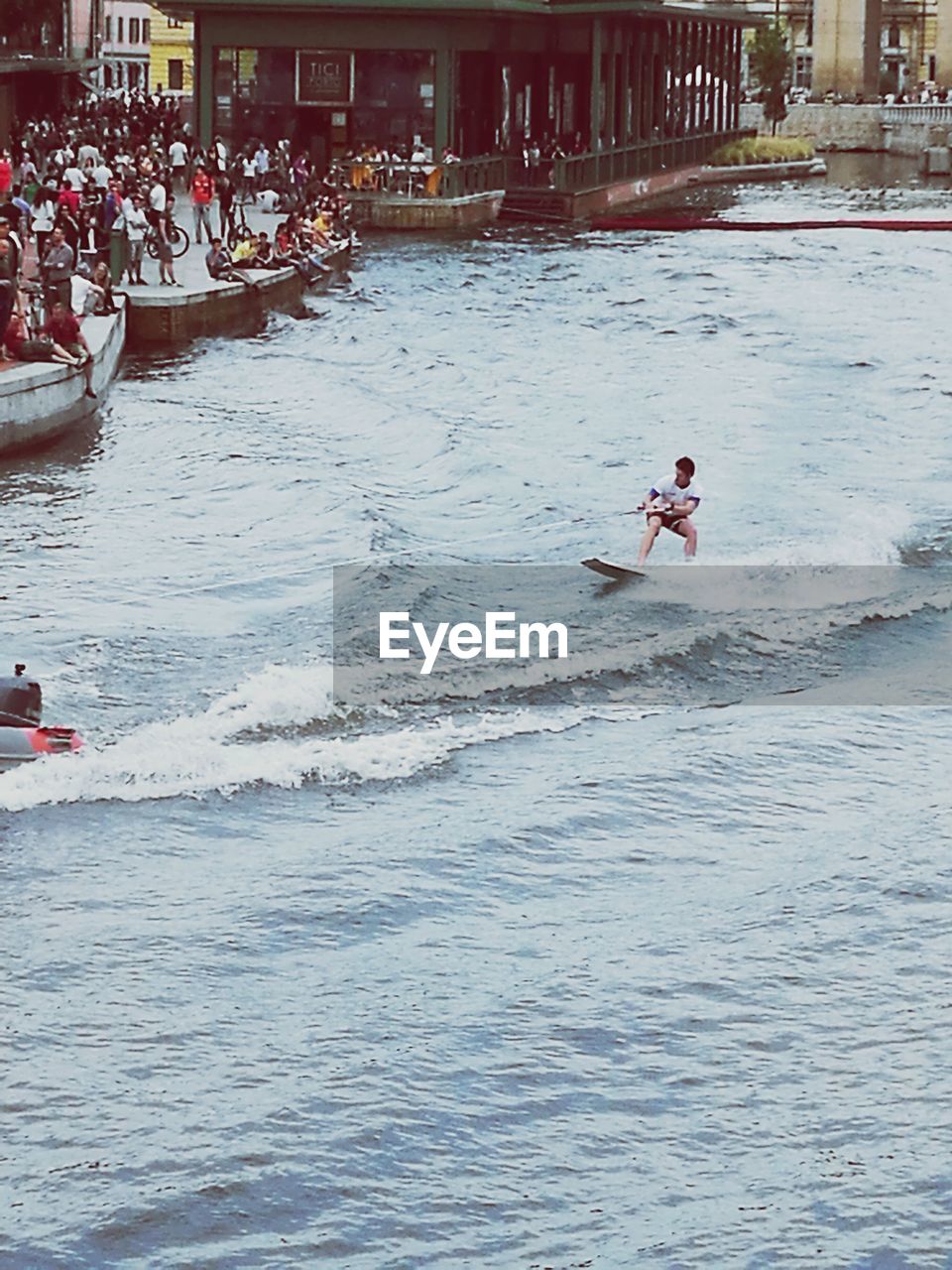 VIEW OF PEOPLE IN WATER