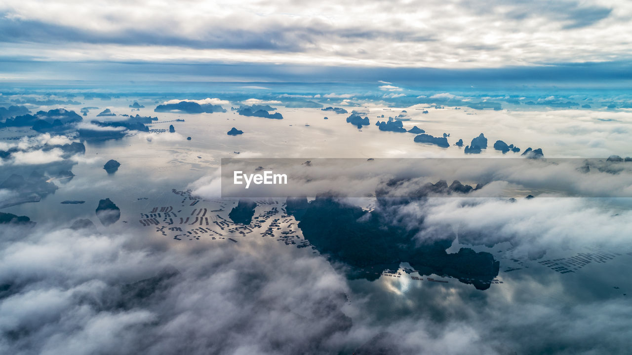 Aerial view of clouds over sea against sky