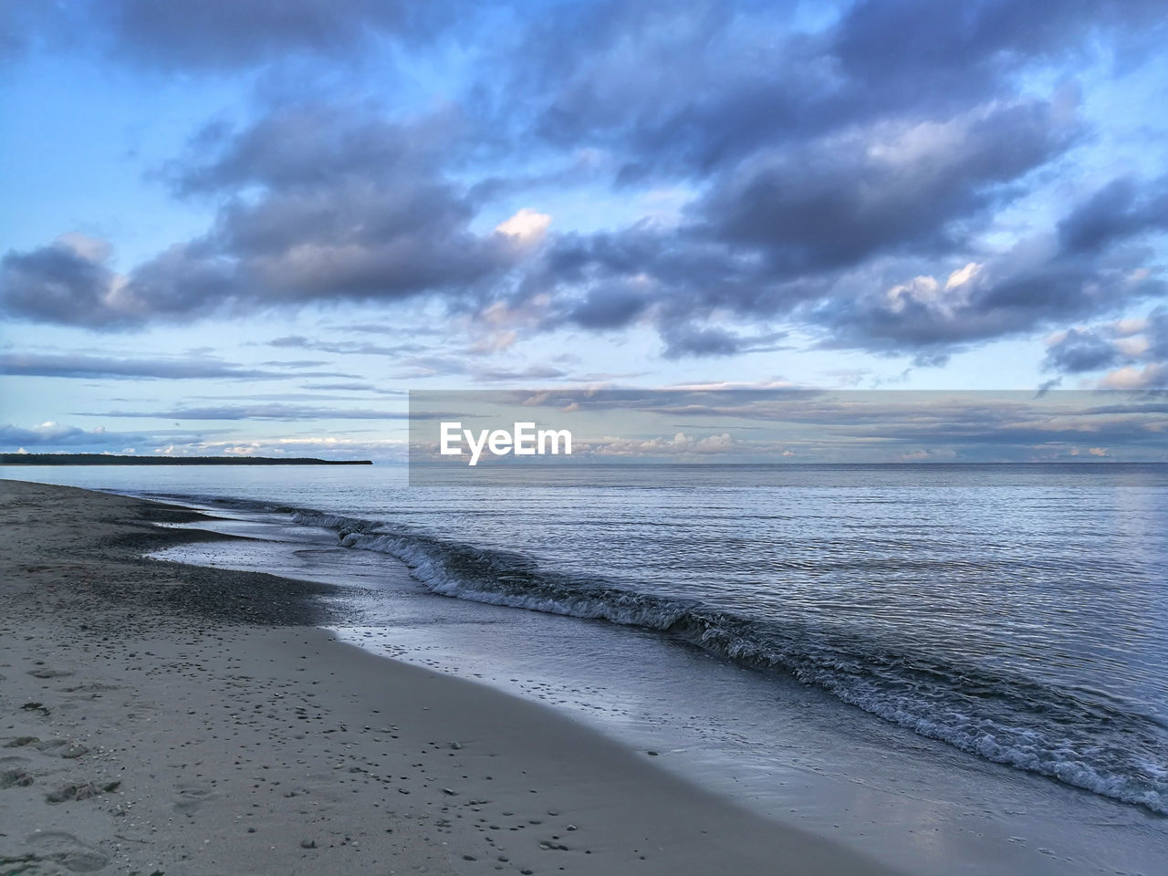 SCENIC VIEW OF SEA DURING SUNSET