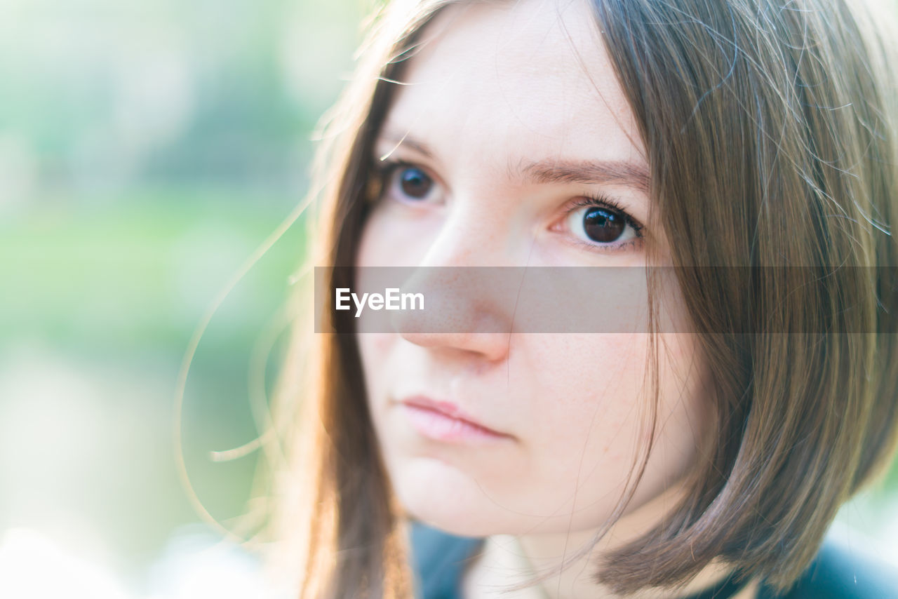 Close-up of thoughtful young woman