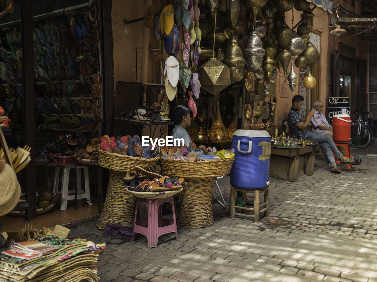 Vendors selling objects at market