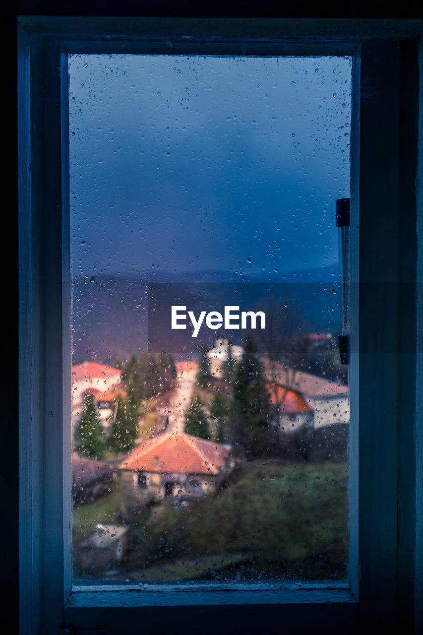 WATER DROPS ON GLASS WINDOW