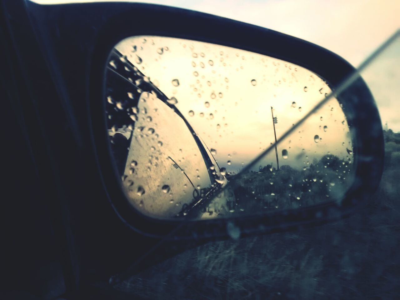 Close-up of raindrops on car window