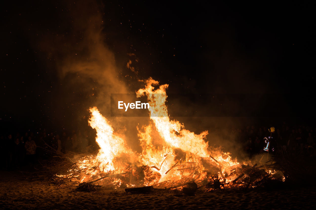 Bonfire against sky at night