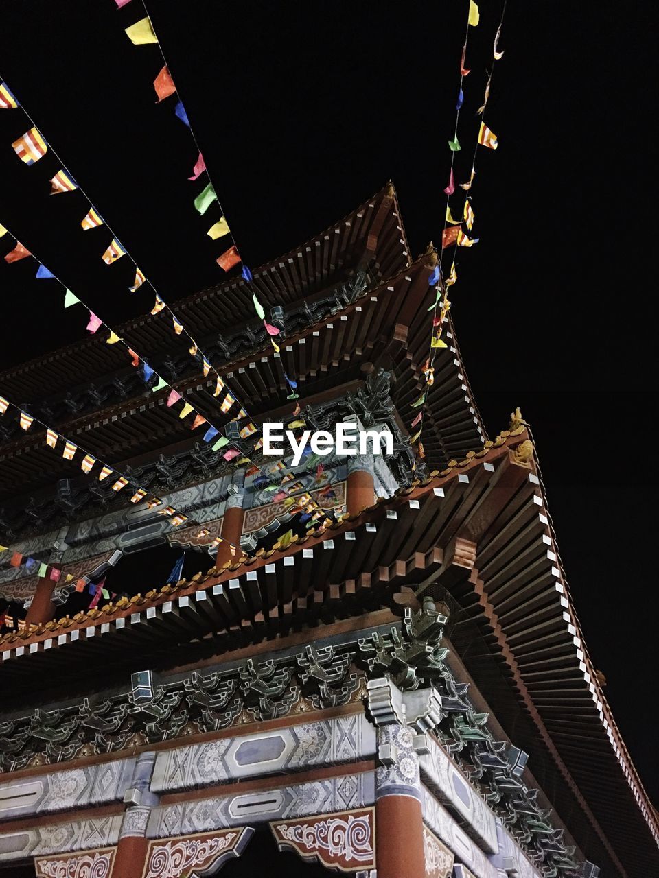 LOW ANGLE VIEW OF TEMPLE AGAINST SKY