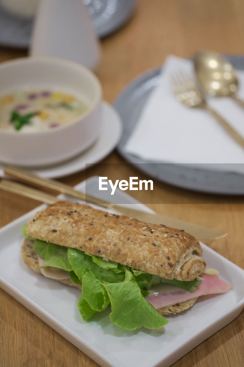 HIGH ANGLE VIEW OF FOOD SERVED ON TABLE