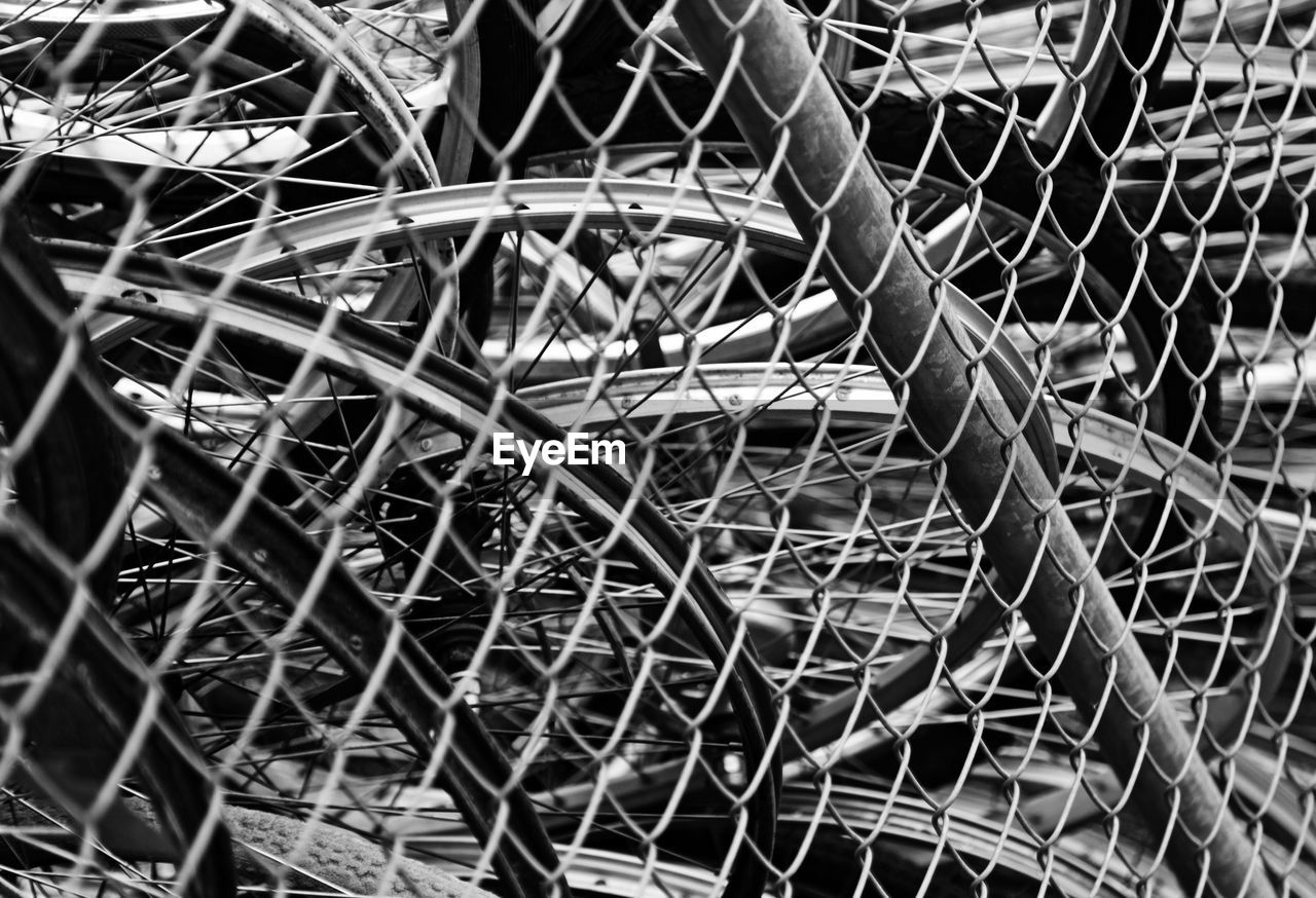 Lots of broken bikes inside a fence at grubbe in umea