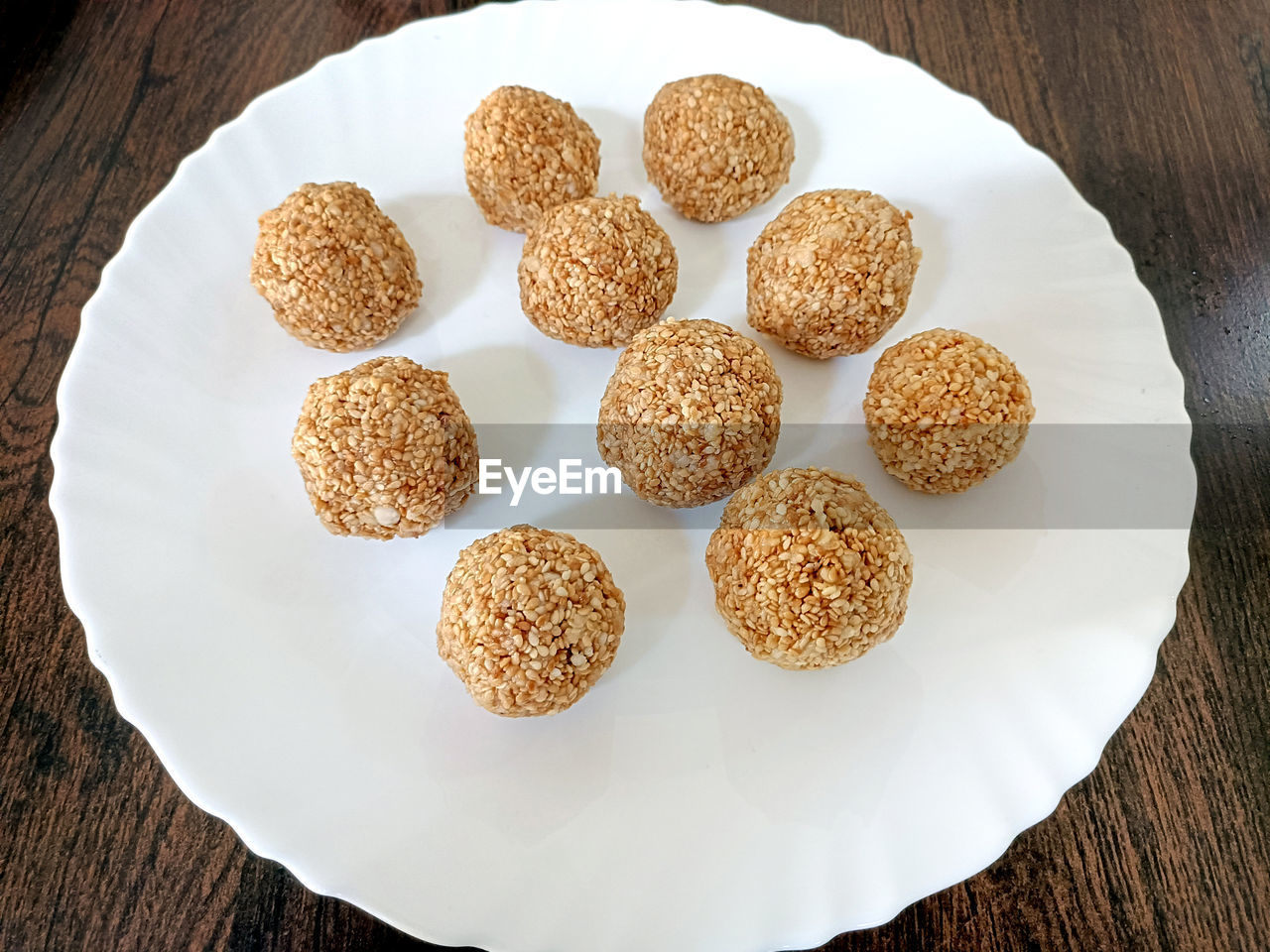 food and drink, food, freshness, dessert, dish, baked, snack, wood, table, no people, high angle view, produce, healthy eating, indoors, directly above, still life, breakfast, plate, seed, wellbeing