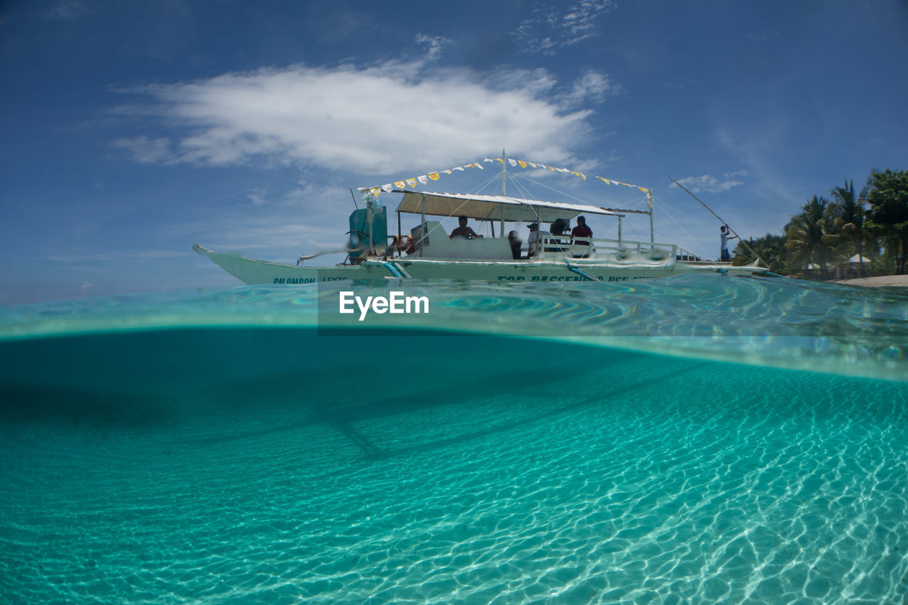 SWIMMING POOL BY SEA AGAINST SKY