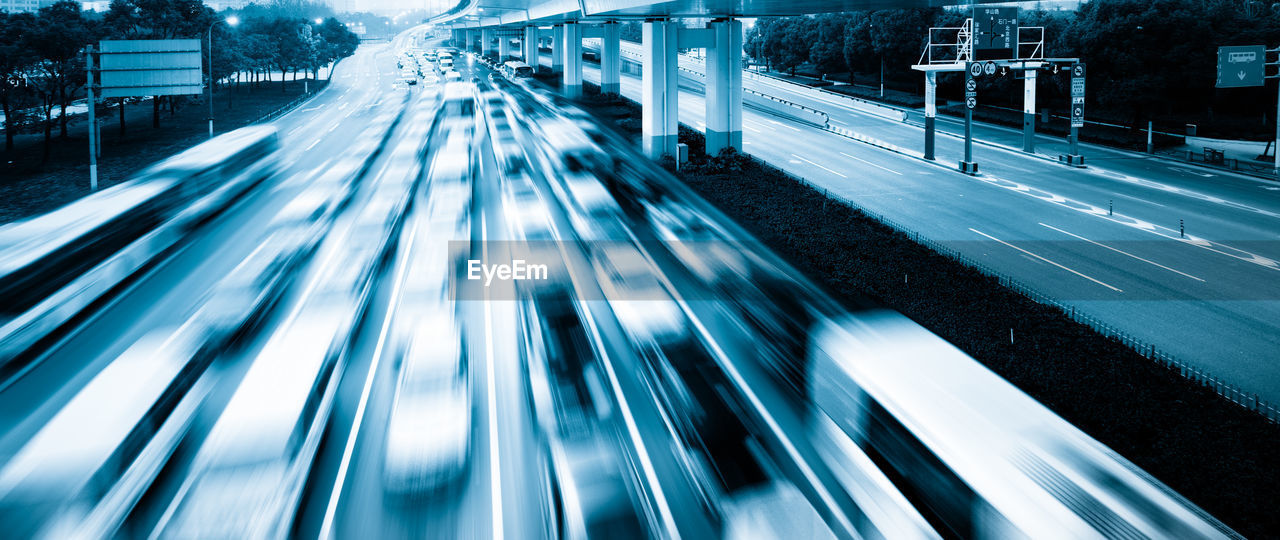 High angle view of light trails on road