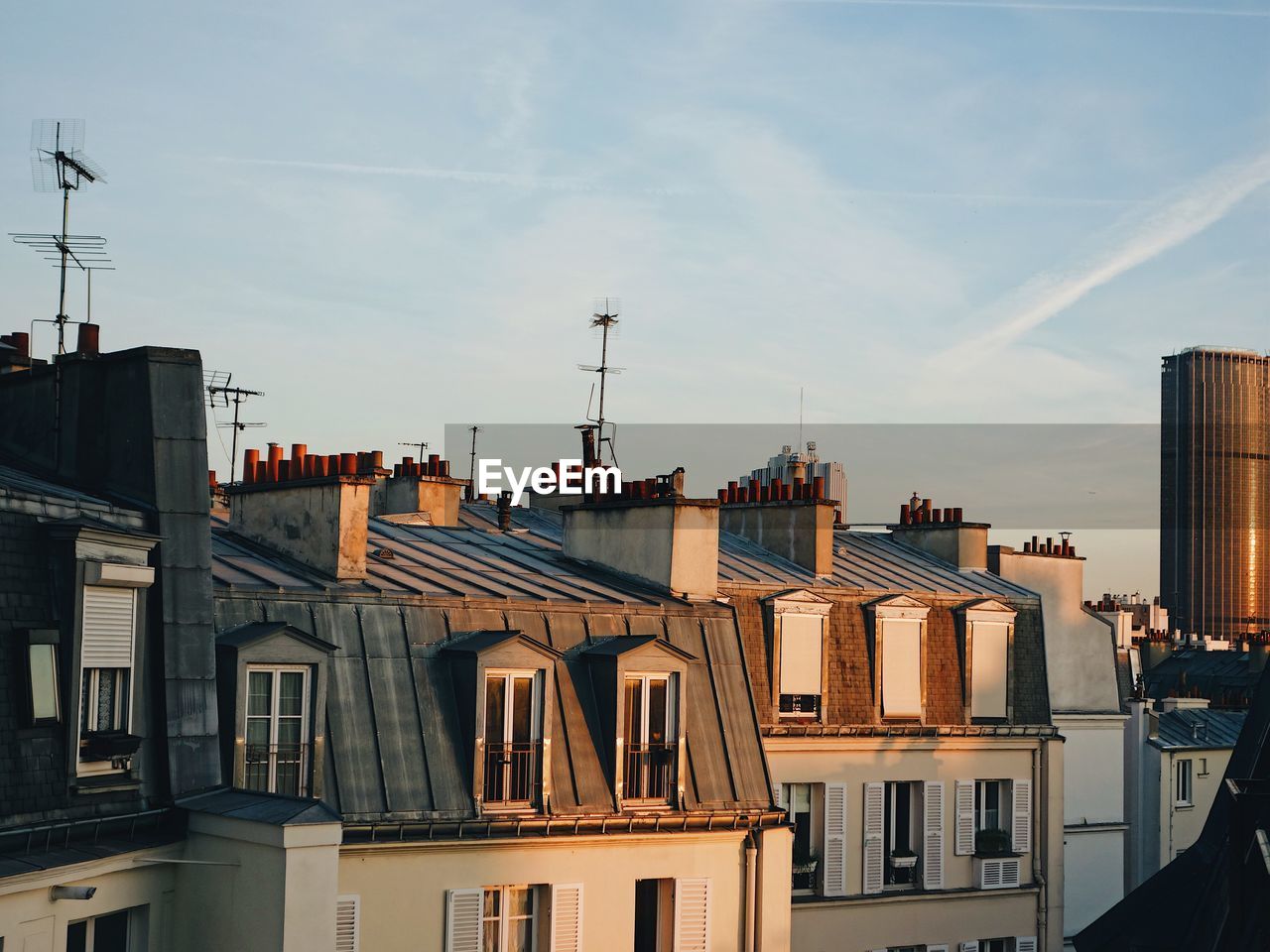 Buildings in city against sky