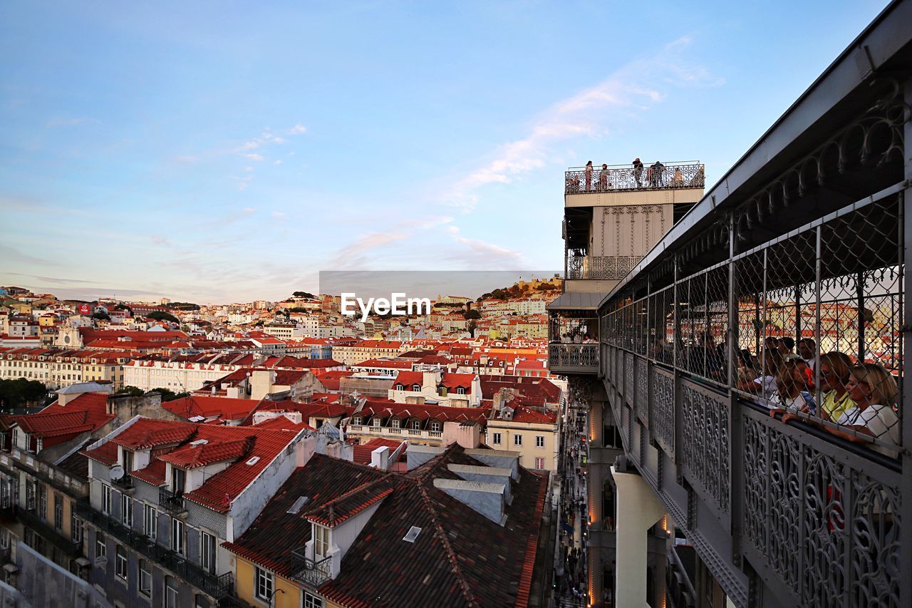 High angle view of buildings in city against sky