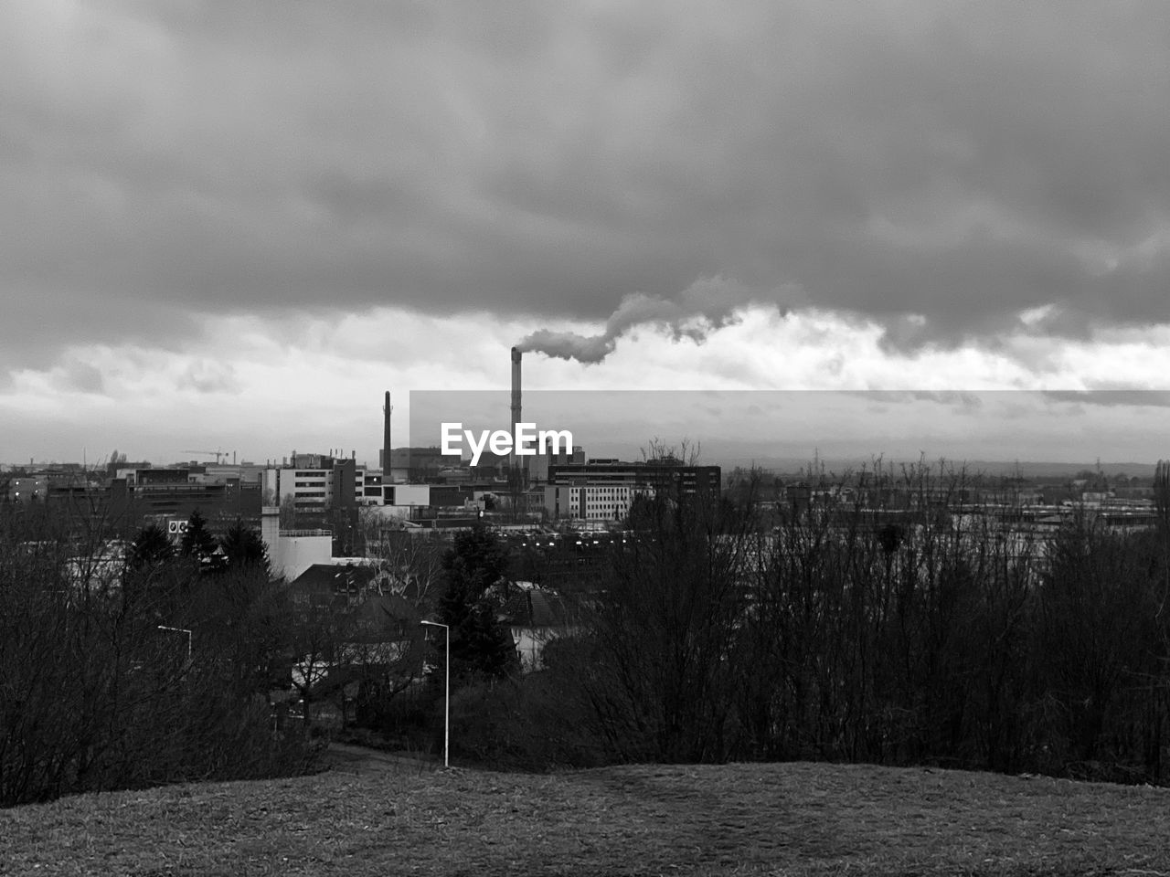 View of factory against sky