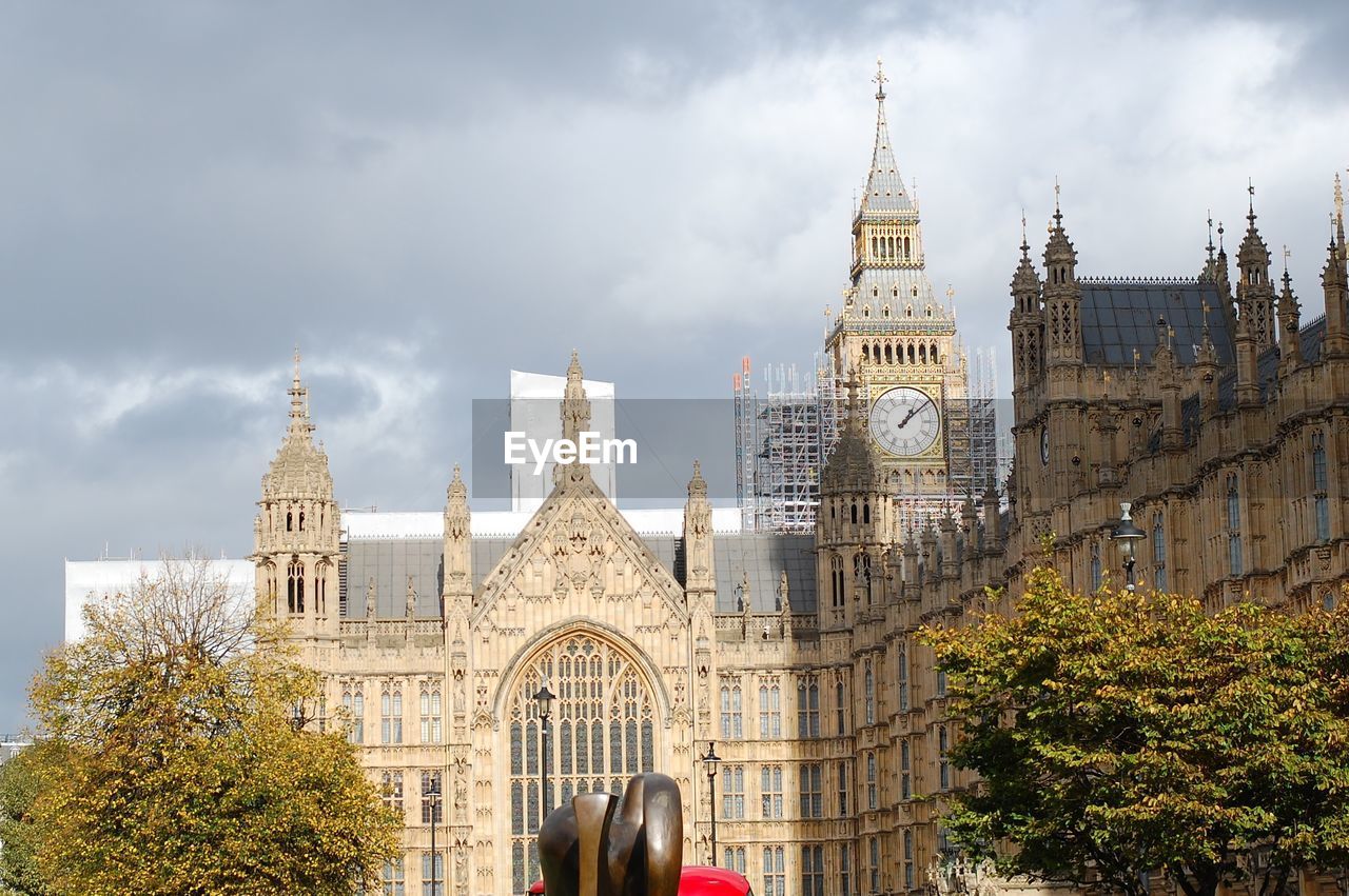 LOW ANGLE VIEW OF A CLOCK TOWER