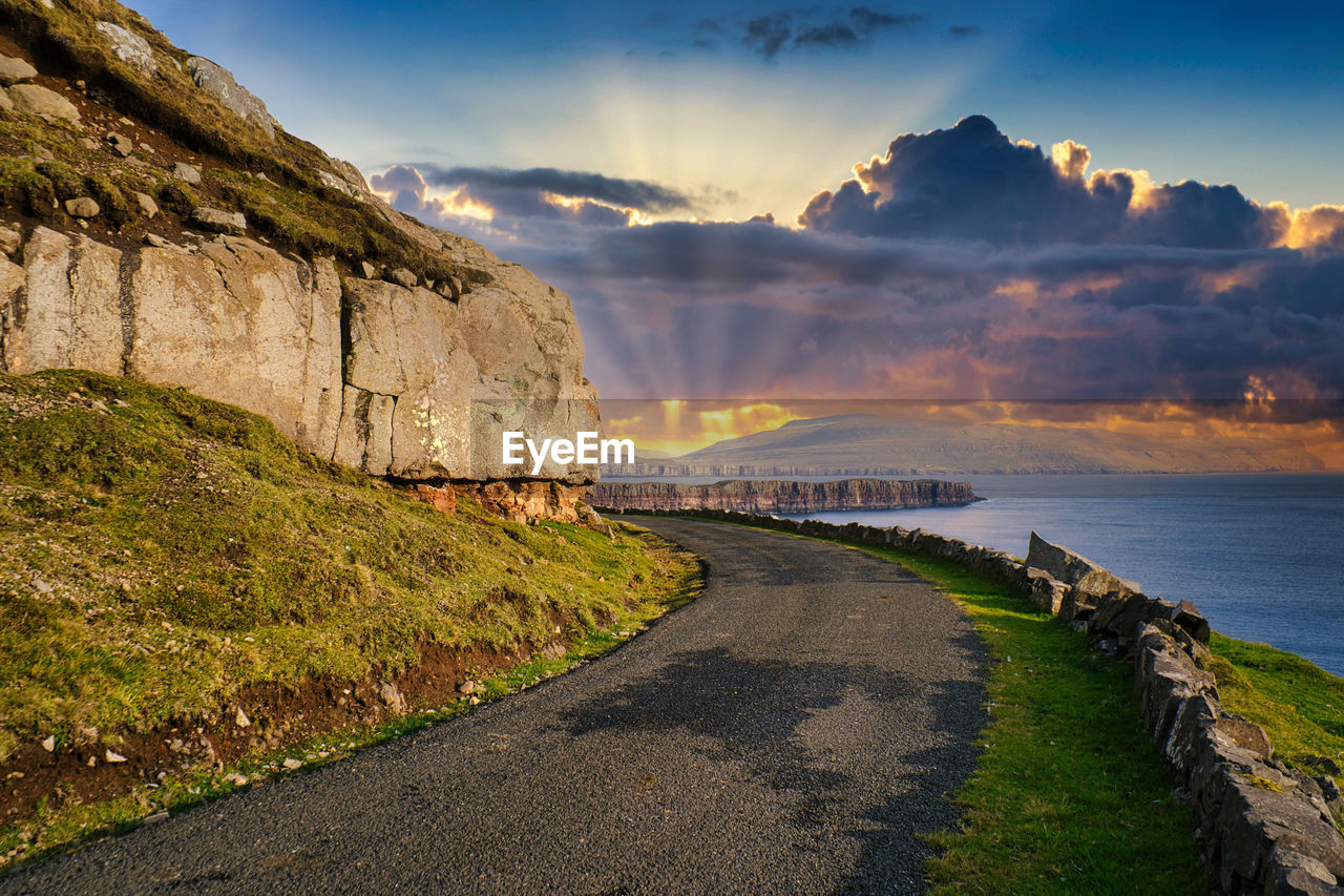 Scenic view of sea against sky during sunset in faroe islands