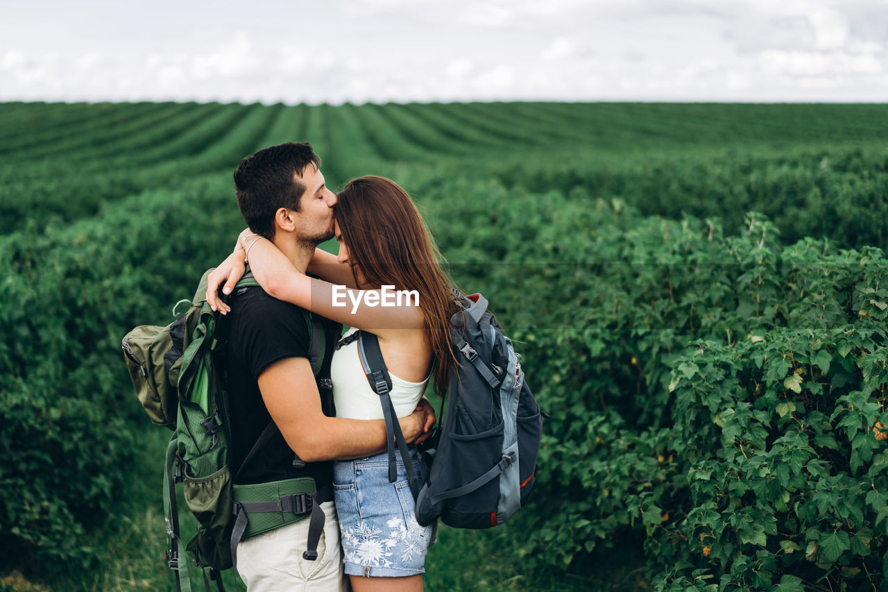 Young couple standing on land